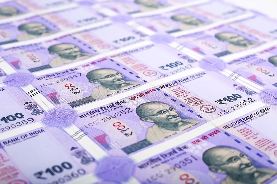 Rupee hits its lowest level, falls by 55 paise to 86.59 per dollar
